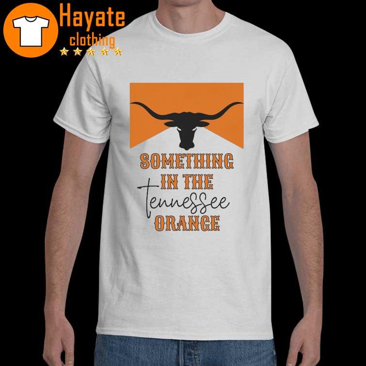 Something in the Tennessee Vol Orange shirt